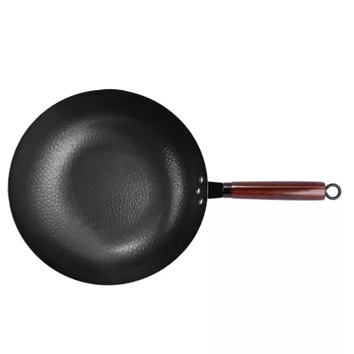 Wok ponva z kuhinjskimi pripomočki
